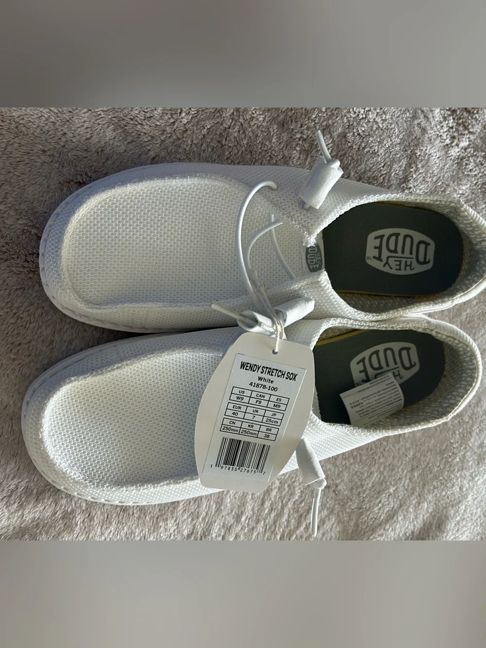 Hey Dude ladies White Slip-On Knit Sneakers. New with tags. W9